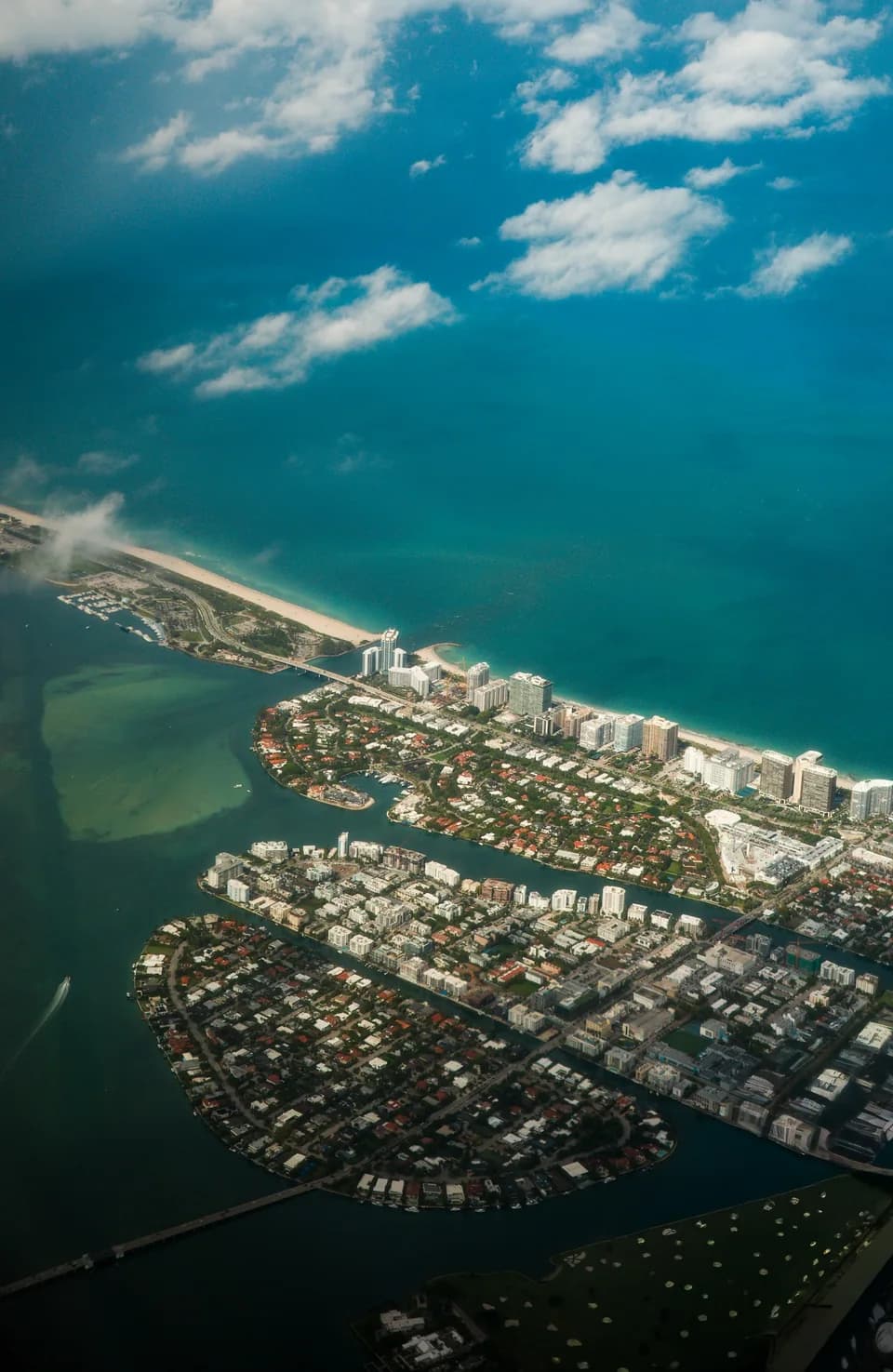 An aerial view of the Miami Beach coastline and blue Atlantic water.